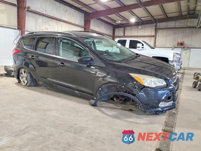 Czwarte zdjęcie samochodu z boku: 2014 FORD ESCAPE SE VIN:1FMCU0GX0EUB84775 - miniatura