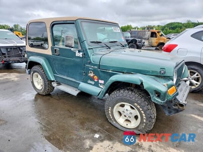 Czwarte zdjęcie samochodu z boku: 2000 JEEP WRANGLER / TJ SAHARA VIN:1J4FA59SXYP770552 - miniatura