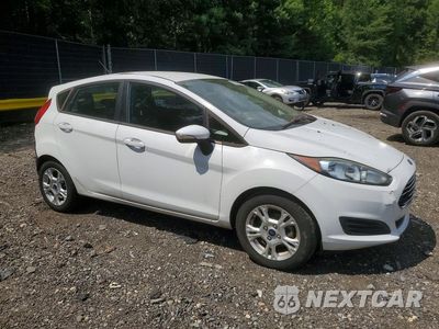 Czwarte zdjęcie samochodu z boku: 2014 FORD FIESTA SE VIN:3FADP4EJ3EM102716 - miniatura