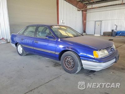 Czwarte zdjęcie samochodu z boku: 1990 FORD TAURUS GL VIN:1FACP52U3LA112026 - miniatura