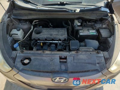 Zdjęcie 12 z 13 samochodu: 2011 HYUNDAI TUCSON GLS VIN:KM8JU3AC6BU261837 - miniatura