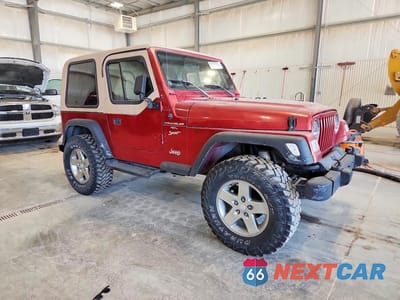 Czwarte zdjęcie samochodu z boku: 1999 JEEP WRANGLER / TJ SPORT VIN:1J4FY19S1XP431293 - miniatura
