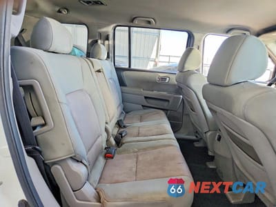 Zdjęcie 11 z 13 samochodu: 2011 HONDA PILOT EX VIN:5FNYF3H40BB033689 - miniatura