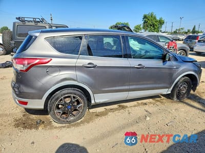 Trzecie zdjęcie samochodu z tyłu: 2014 FORD ESCAPE SE VIN:1FMCU0GX5EUE13872 - miniatura