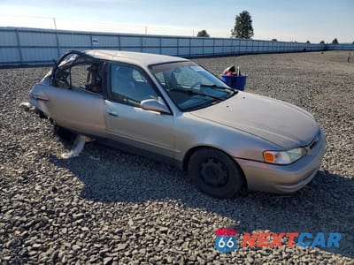 Czwarte zdjęcie samochodu z boku: 1998 TOYOTA COROLLA VE VIN:1NXBR18E9WZ005828 - miniatura