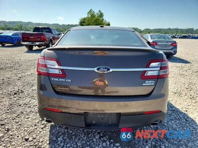 Zdjęcie 6 z 12 samochodu: 2015 FORD TAURUS SEL VIN:1FAHP2E8XFG159218 - miniatura