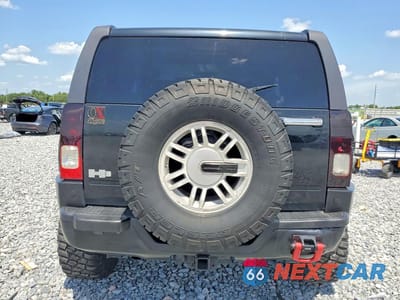 Zdjęcie 6 z 13 samochodu: 2006 HUMMER H3 VIN:5GTDN136768128005 - miniatura
