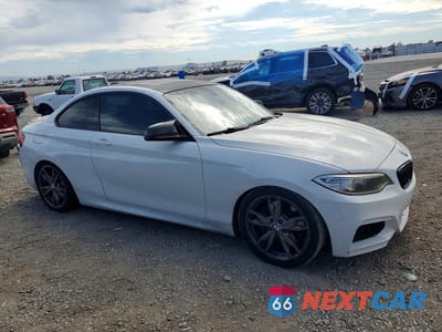 Czwarte zdjęcie samochodu z boku: 2016 BMW M235I VIN:WBA1J7C5XGV289898 - miniatura