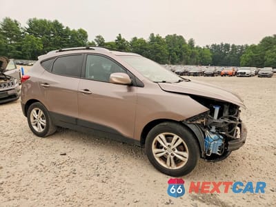 Czwarte zdjęcie samochodu z boku: 2012 HYUNDAI TUCSON GLS VIN:KM8JUCAC7CU373239 - miniatura