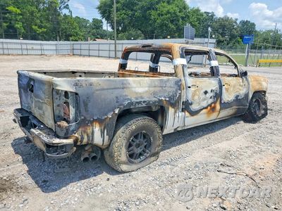 Trzecie zdjęcie samochodu z tyłu: 2016 CHEVROLET SILVERADO K1500 HIGH COUNTRY VIN:3GCUKTEJ5GG166213 - miniatura