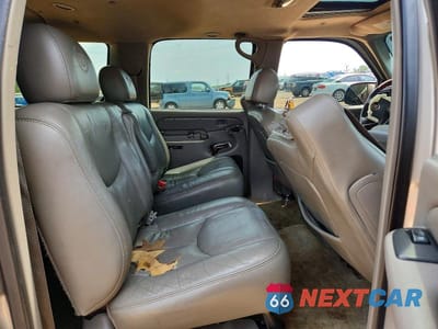 Zdjęcie 11 z 13 samochodu: 2004 CADILLAC ESCALADE ESV VIN:3GYFK66N14G213240 - miniatura