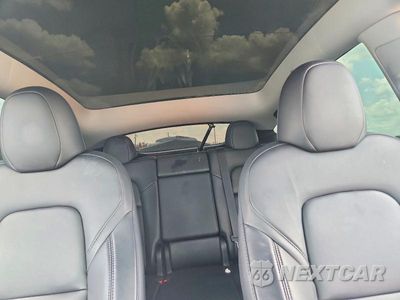 Zdjęcie 10 z 13 samochodu: 2023 TESLA MODEL Y VIN:7SAYGAEE8PF832113 - miniatura