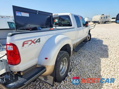 Trzecie zdjęcie samochodu z tyłu: 2013 FORD F350 SUPER DUTY VIN:1FT8W3DT0DEA78360 - miniatura