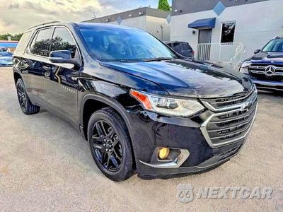 Czwarte zdjęcie samochodu z boku: 2021 CHEVROLET TRAVERSE LT VIN:1GNERGKW7MJ168621 - miniatura