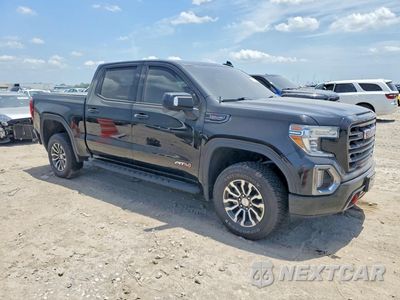 Czwarte zdjęcie samochodu z boku: 2021 GMC SIERRA K1500 AT4 VIN:3GTP9EEL6MG380337 - miniatura