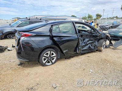 Trzecie zdjęcie samochodu z tyłu: 2016 TOYOTA PRIUS THREE TOURING VIN:JTDKARFU2G3023521 - miniatura
