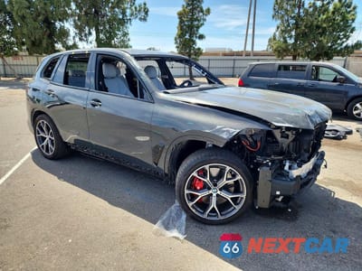 Czwarte zdjęcie samochodu z boku: 2026 BMW X5 XDRIVE50E VIN:5UX43EU08T9025646 - miniatura