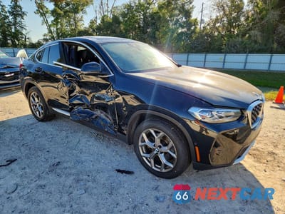 Czwarte zdjęcie samochodu z boku: 2024 BMW X4 XDRIVE30I VIN:5UX33DT08R9U09202 - miniatura