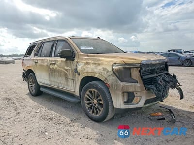 Czwarte zdjęcie samochodu z boku: 2022 GMC YUKON SLT VIN:1GKS1BKD1NR285431 - miniatura