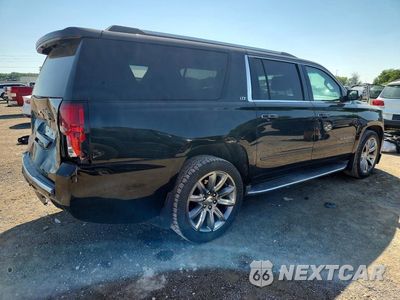 Trzecie zdjęcie samochodu z tyłu: 2015 CHEVROLET SUBURBAN K1500 LTZ VIN:1GNSKKKC1FR239705 - miniatura