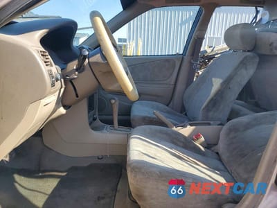 Zdjęcie 7 z 12 samochodu: 1998 TOYOTA COROLLA VE VIN:1NXBR18E9WZ005828 - miniatura