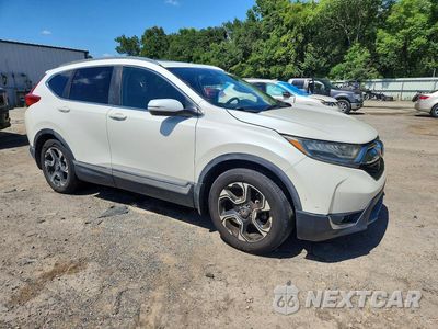 Czwarte zdjęcie samochodu z boku: 2018 HONDA CR-V TOURING VIN:2HKRW1H91JH503085 - miniatura