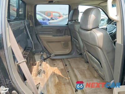 Zdjęcie 10 z 12 samochodu: 2006 HONDA RIDGELINE RTL VIN:2HJYK16516H557747 - miniatura