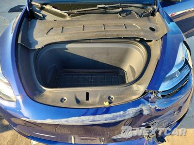 Zdjęcie 11 z 12 samochodu: 2023 TESLA MODEL Y VIN:7SAYGDEE0PA086481 - miniatura
