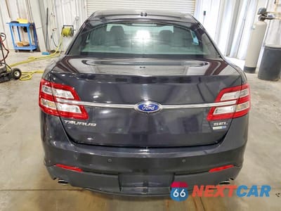 Zdjęcie 6 z 12 samochodu: 2015 FORD TAURUS SEL VIN:1FAHP2H88FG155535 - miniatura