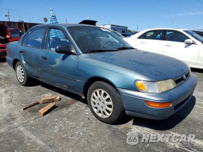 Czwarte zdjęcie samochodu z boku: 1995 TOYOTA COROLLA DX VIN:JT2AE09B8S0100661 - miniatura