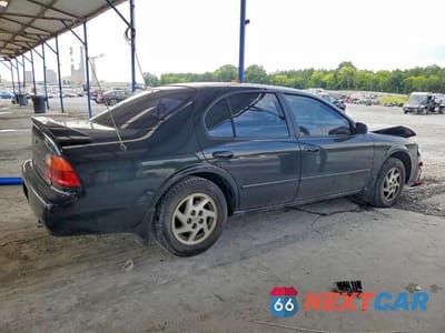 Trzecie zdjęcie samochodu z tyłu: 1996 NISSAN MAXIMA GXE VIN:JN1CA21D5TM403902 - miniatura