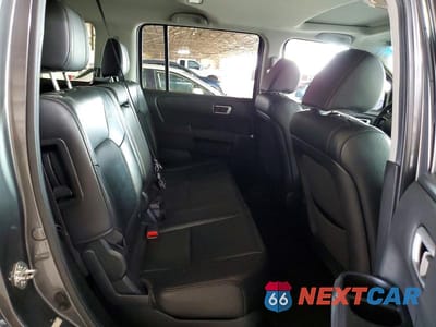 Zdjęcie 11 z 13 samochodu: 2012 HONDA PILOT EXL VIN:5FNYF3H5XCB040305 - miniatura