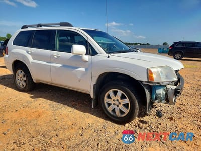 Czwarte zdjęcie samochodu z boku: 2011 MITSUBISHI ENDEAVOR LS VIN:4A4JN2ASXBE034530 - miniatura