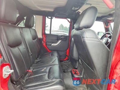 Zdjęcie 11 z 13 samochodu: 2014 JEEP WRANGLER UNLIMITED SAHARA VIN:1C4BJWEG0EL128355 - miniatura
