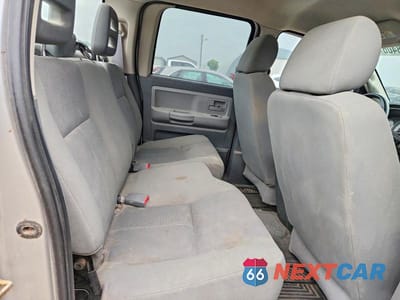 Zdjęcie 10 z 12 samochodu: 2006 DODGE DAKOTA QUAD SLT VIN:1D7HE48K26S701983 - miniatura