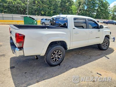 Trzecie zdjęcie samochodu z tyłu: 2023 TOYOTA TACOMA SR5 V6 VIN:3TMCZ5AN7PM572314 - miniatura