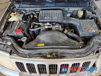 Zdjęcie 11 z 12 samochodu: 1999 JEEP GRAND CHEROKEE LIMITED VIN:1J4GW68N4XC689107 - miniatura