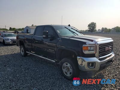 Czwarte zdjęcie samochodu z boku: 2015 GMC SIERRA K2500 SLE VIN:1GT22YEG9FZ527031 - miniatura