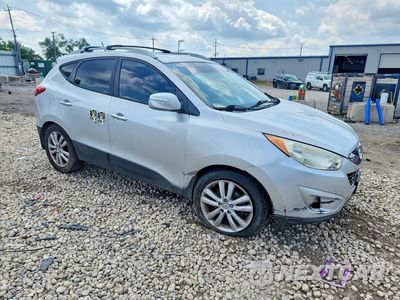 Czwarte zdjęcie samochodu z boku: 2013 HYUNDAI TUCSON LIMITED VIN:KM8JU3AC9DU585304 - miniatura