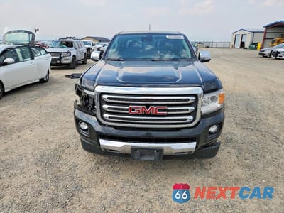 Piąte zdjęcie samochodu w środku: 2017 GMC CANYON SLT VIN:1GTG6DEN0H1157591 - miniatura