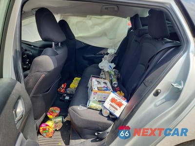 Zdjęcie 10 z 12 samochodu: 2022 TOYOTA PRIUS LE AWD-E VIN:JTDL9MFU0N3033834 - miniatura