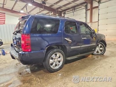 Trzecie zdjęcie samochodu z tyłu: 2009 CHEVROLET TAHOE K1500 LTZ VIN:1GNFK33059R171151 - miniatura