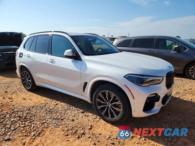 Czwarte zdjęcie samochodu z boku: 2020 BMW X5 M50I VIN:5UXJU4C05L9C67180 - miniatura