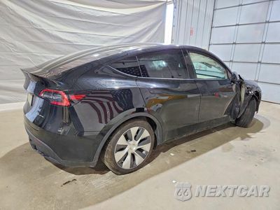 Trzecie zdjęcie samochodu z tyłu: 2021 TESLA MODEL Y VIN:5YJYGAEEXMF250359 - miniatura