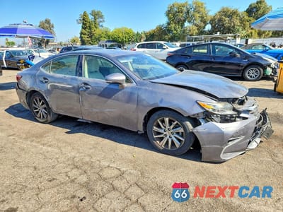 Czwarte zdjęcie samochodu z boku: 2016 LEXUS ES 300H VIN:JTHBW1GG9G2131828 - miniatura