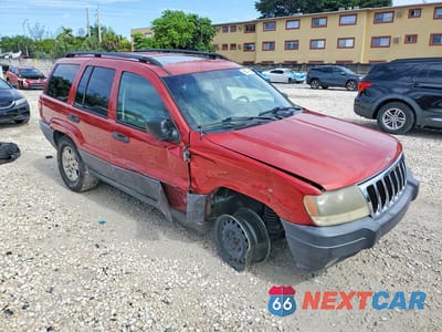 Czwarte zdjęcie samochodu z boku: 2003 JEEP GRAND CHEROKEE LAREDO VIN:1J4GX48N03C539023 - miniatura