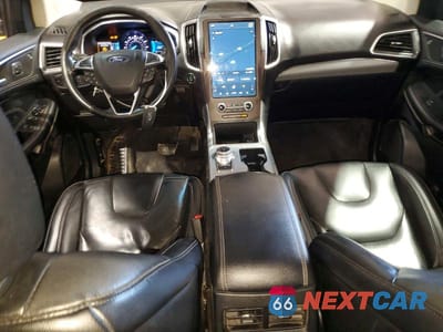 Zdjęcie 8 z 13 samochodu: 2021 FORD EDGE TITANIUM VIN:2FMPK4K93MBA26930 - miniatura