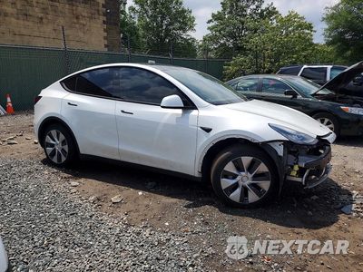 Czwarte zdjęcie samochodu z boku: 2021 TESLA MODEL Y VIN:5YJYGAEE9MF208832 - miniatura