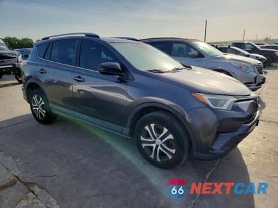 Czwarte zdjęcie samochodu z boku: 2018 TOYOTA RAV4 LE VIN:JTMZFREV9JJ740799 - miniatura