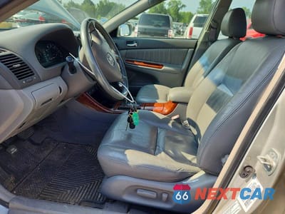 Zdjęcie 7 z 12 samochodu: 2002 TOYOTA CAMRY XLE V6 VIN:4T1BF30K22U506639 - miniatura